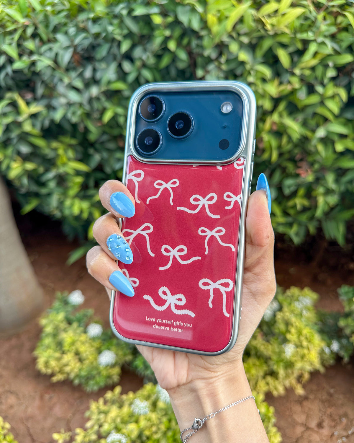 Bowtiful glossy wine-red iPhone phone case with pink bow print and chrome camera trim – TOKFO