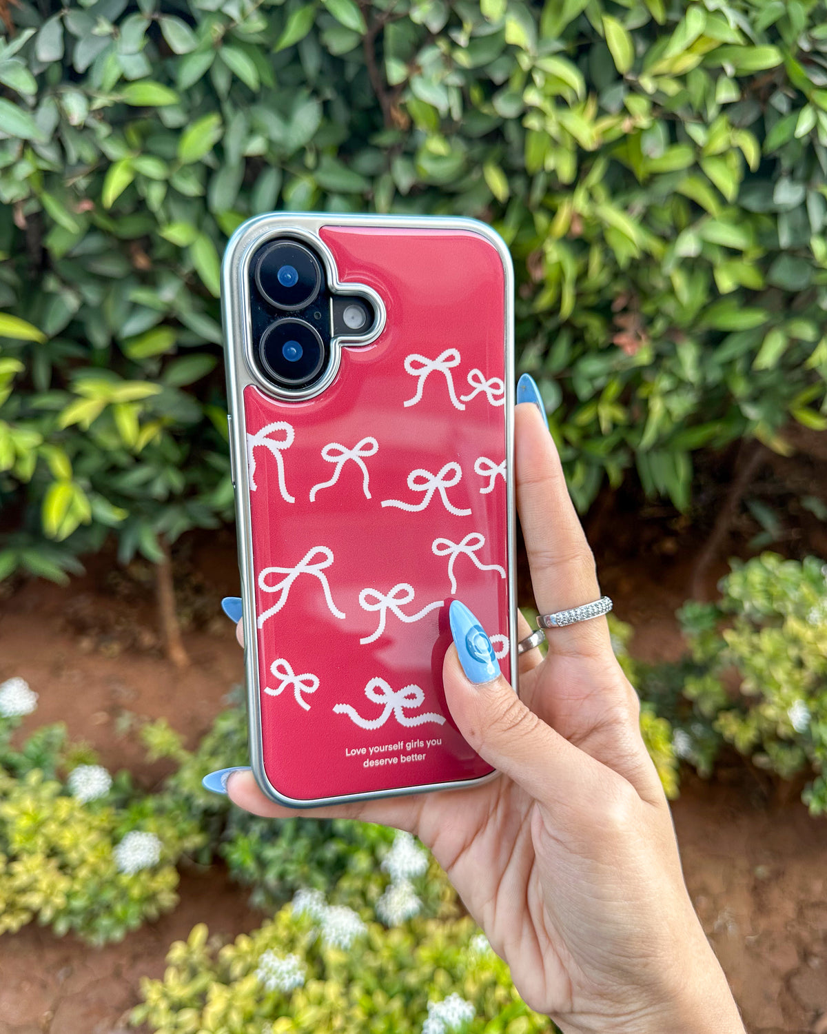 Bowtiful glossy wine-red iPhone phone case with pink bow print and chrome camera trim โ TOKFO