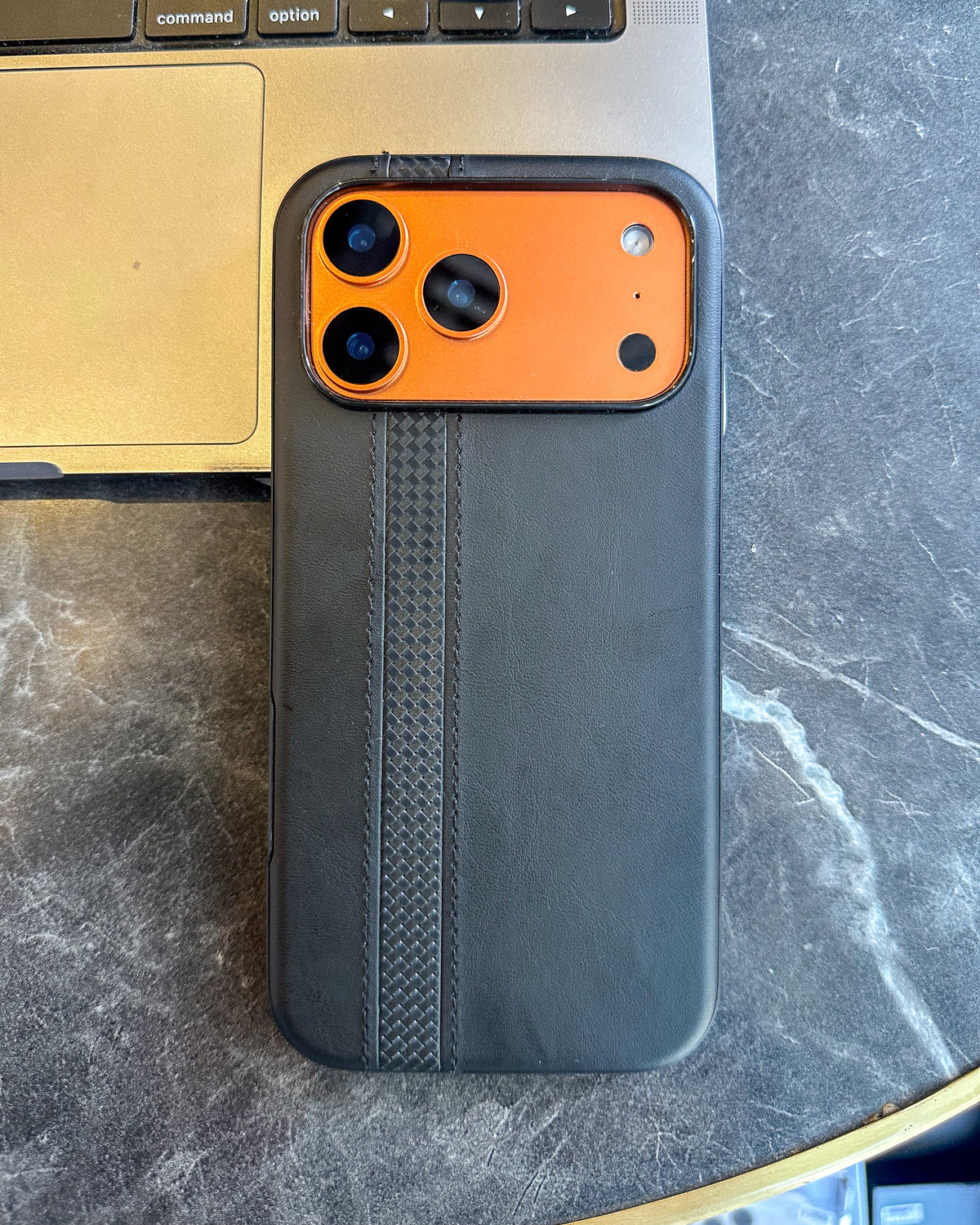 Racer Leather black leatherette iPhone case with vertical woven stripe and open camera cutout โ TOKFO