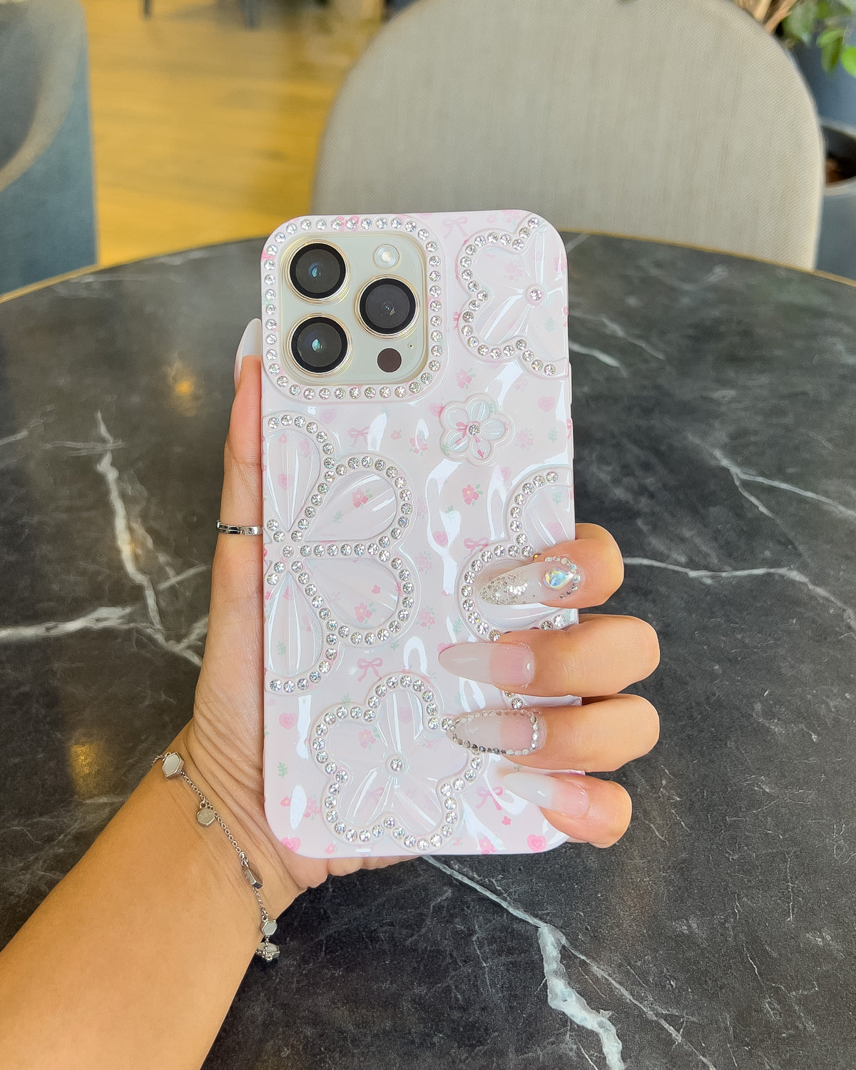 Blossom Crush pink pearlescent iPhone case with rhinestone flowers and pink bows – TOKFO