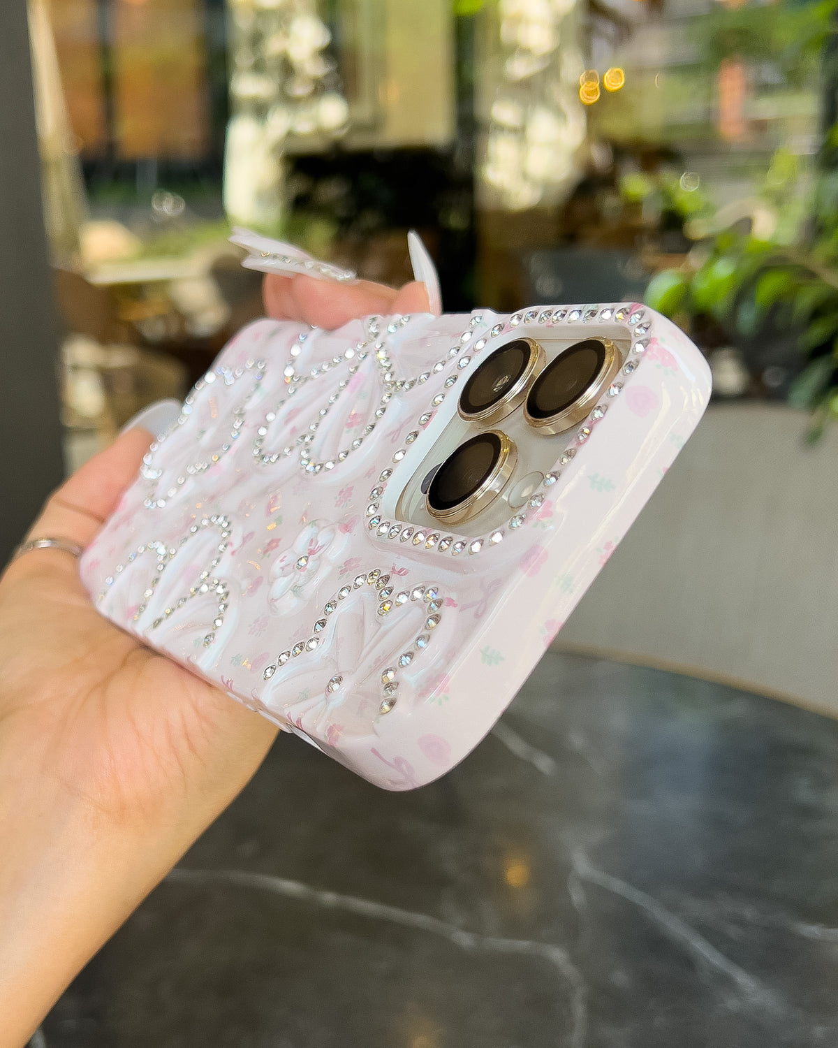 Blossom Crush pink pearlescent iPhone case with rhinestone flowers and pink bows – TOKFO