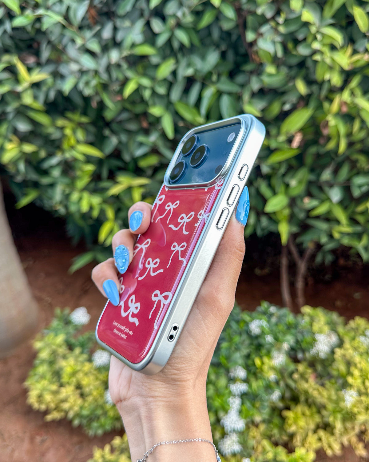 Bowtiful glossy wine-red iPhone phone case with pink bow print and chrome camera trim – TOKFO
