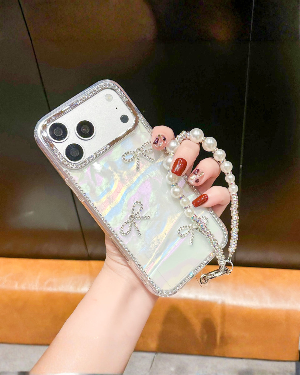 Disco Queen holographic aurora iPhone phone case with rhinestone border, rhinestone bows and pearl wrist chain – TOKFO