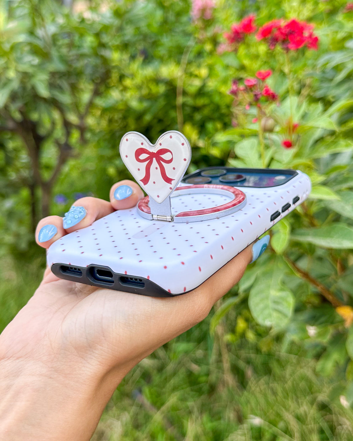 TOKFO Polka Dot Bow Stand phone case with the heart-shaped kickstand standing up
