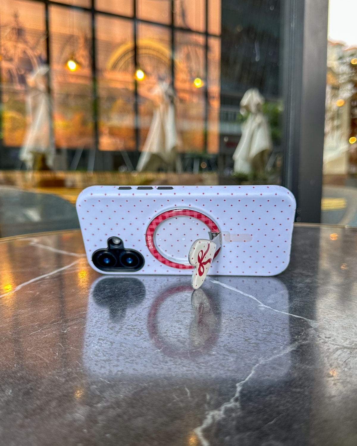 TOKFO Polka Dot Bow Stand phone case standing landscape on a table with the heart-shaped kickstand