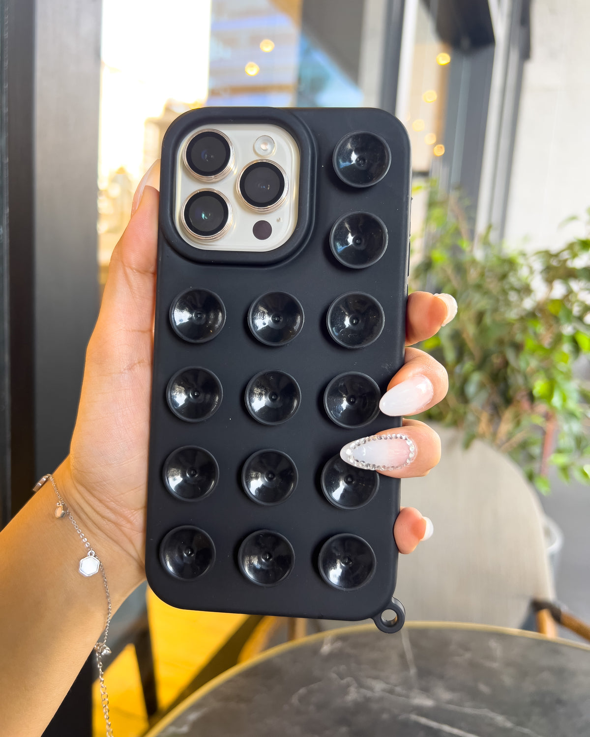 Suction Grip black silicone iPhone case with 3D suction cups and lanyard loop – TOKFO