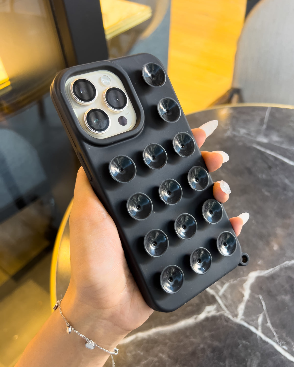 Suction Grip black silicone iPhone case with 3D suction cups and lanyard loop – TOKFO